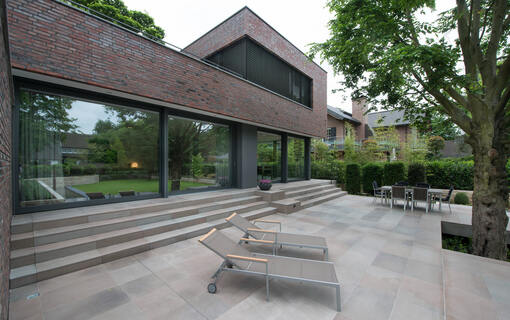 Architectural highlight with generous natural stone flooring